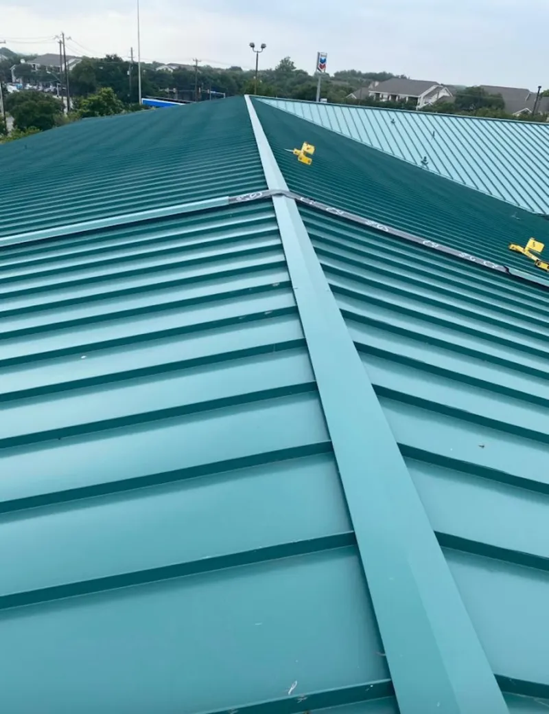 Green commercial metal roof ridge and valley for Metal Roof Repair in Luling